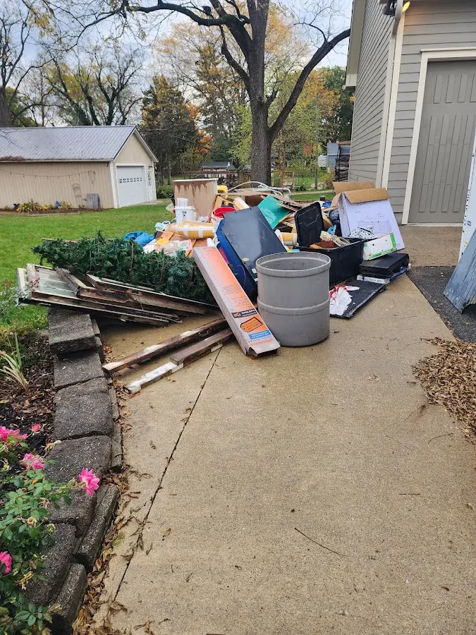 Dumpster being loaded with debris for Residential Dumpster Rental in Casa de Oro-Mount Helix